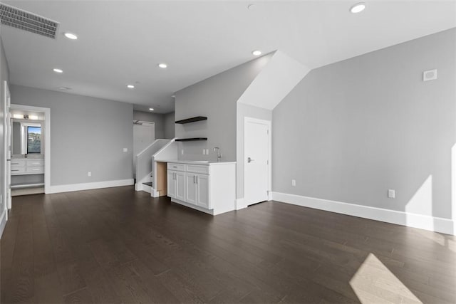 350 Oliver Ave Unit 1301/1401, Downtown Pgh, PA 15222 - unfurnished living room with dark wood-style floors, recessed lighting, and stairway