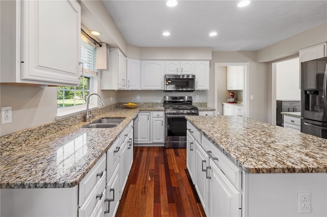 706 Williamsburg Ct, Cranberry Twp, PA 16066 - kitchen featuring stainless steel appliances, recessed lighting, light stone countertops, dark wood-type flooring, and white cabinets