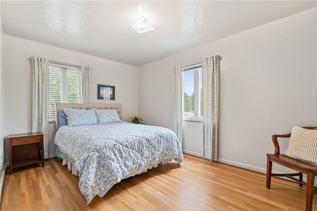 418 Sylvania Dr, Ross Twp, PA 15229 - bedroom featuring light wood-style flooring and baseboards