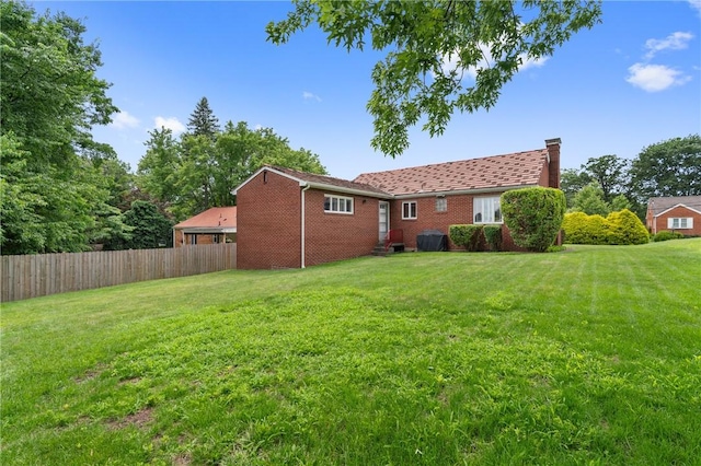 418 Sylvania Dr, Ross Twp, PA 15229 - rear view of property featuring a chimney and brick siding