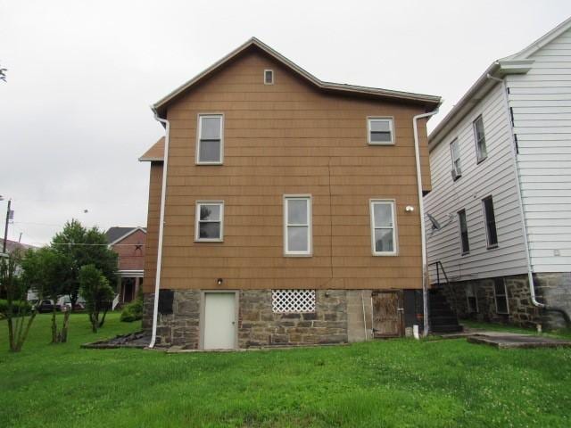 103 Memorial St, Dunbar, PA 15431 - back of house with stairs and a lawn