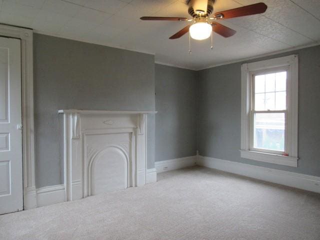 103 Memorial St, Dunbar, PA 15431 - unfurnished living room featuring carpet flooring and a ceiling fan