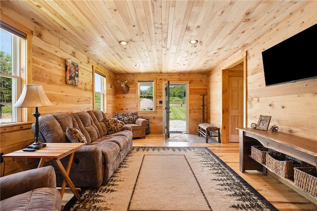 1171 Dividing Ridge Rd, Allegheny Twp, PA 15538 - living room featuring light wood finished floors, plenty of natural light, wooden walls, recessed lighting, and wooden ceiling