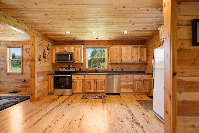 1171 Dividing Ridge Rd, Allegheny Twp, PA 15538 - kitchen with appliances with stainless steel finishes, wood ceiling, light wood finished floors, dark countertops, and healthy amount of natural light