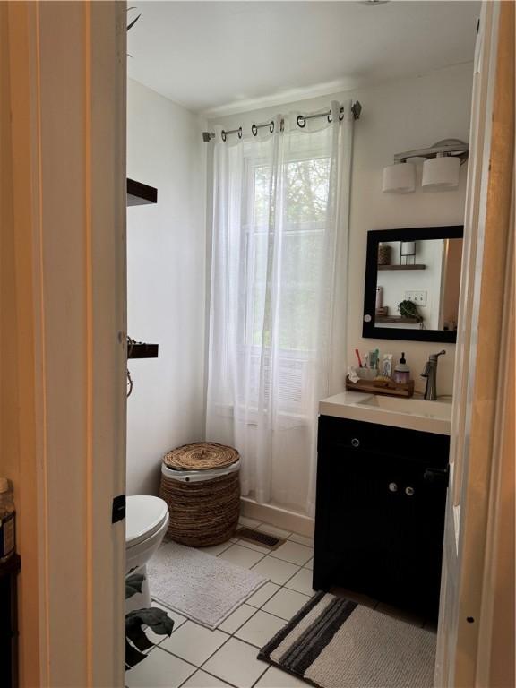 1418 Neshannock Blvd, New Castle/2Nd, PA 16105 - half bath featuring vanity and tile patterned floors