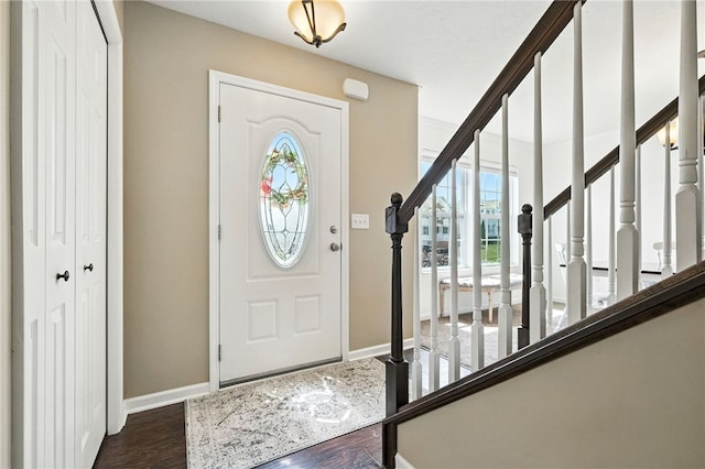 412 Colt Cir, Findlay Twp, PA 15026 - foyer entrance featuring healthy amount of natural light, dark wood-style floors, and stairway