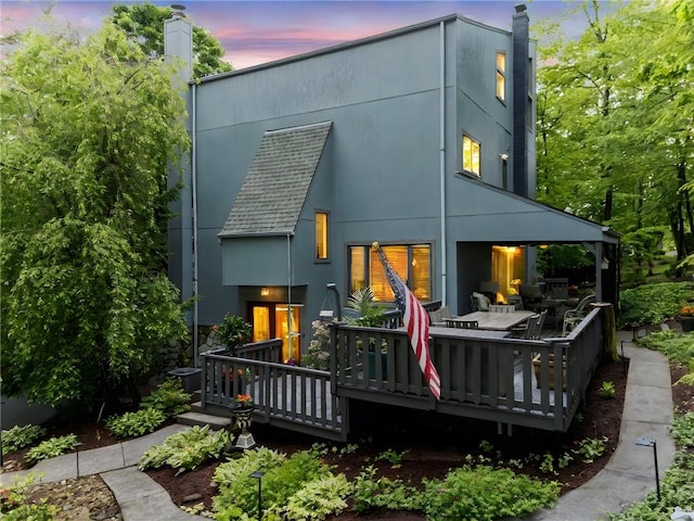 101 Jane Kirk Ct, Center Twp, PA 15001 - back of property with a chimney, a wooden deck, stucco siding, and a shingled roof