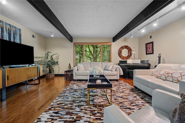 101 Jane Kirk Ct, Center Twp, PA 15001 - living area with wood finished floors and beam ceiling