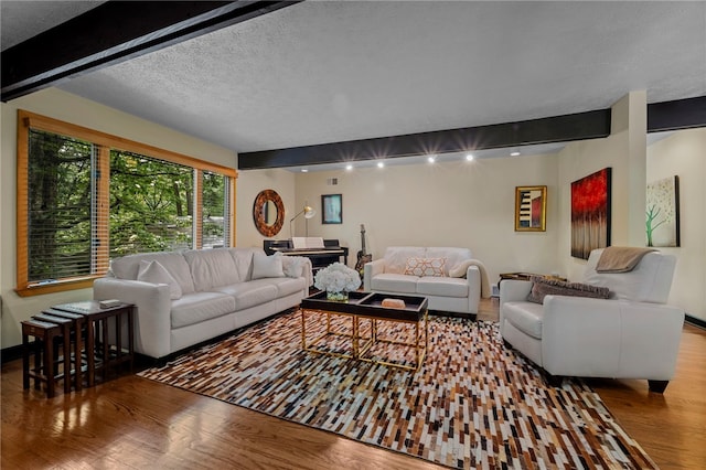 101 Jane Kirk Ct, Center Twp, PA 15001 - living room featuring beam ceiling, wood finished floors, and a textured ceiling