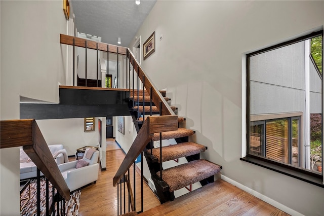 101 Jane Kirk Ct, Center Twp, PA 15001 - stairs featuring wood finished floors and baseboards