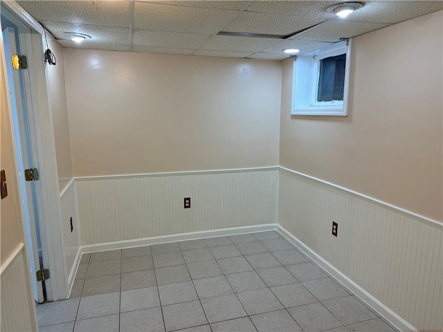 2350 Mount Vernon Ave, Murrysville, PA 15632 - unfurnished room featuring wainscoting, light tile patterned flooring, and a paneled ceiling