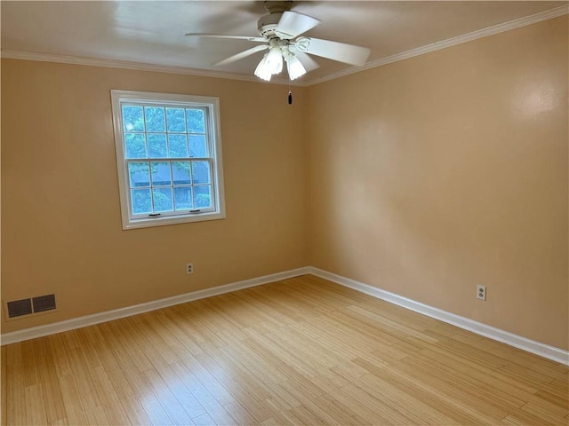 2350 Mount Vernon Ave, Murrysville, PA 15632 - spare room featuring light wood finished floors, a ceiling fan, and crown molding