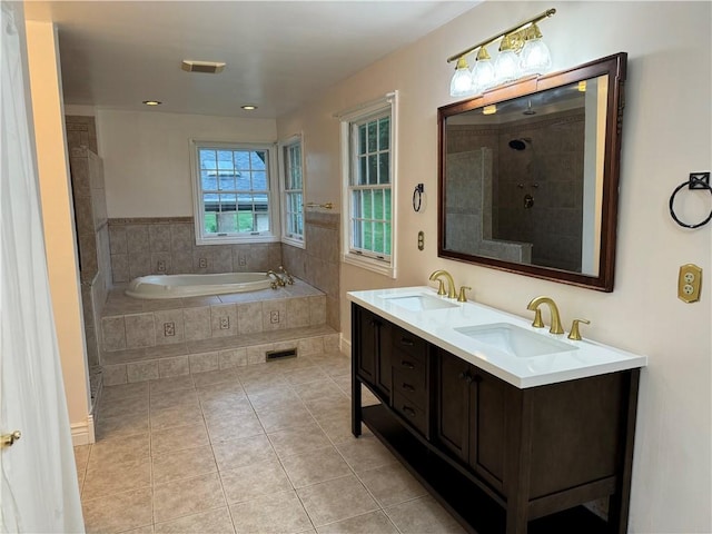 2350 Mount Vernon Ave, Murrysville, PA 15632 - bathroom with a garden tub, tile patterned flooring, double vanity, and a tile shower
