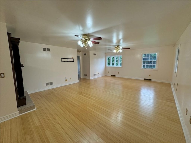 2350 Mount Vernon Ave, Murrysville, PA 15632 - unfurnished living room with ceiling fan and light wood-style flooring