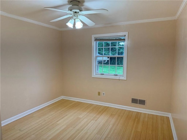2350 Mount Vernon Ave, Murrysville, PA 15632 - spare room with light wood-style floors, a ceiling fan, and crown molding