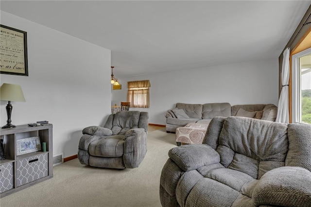 2203 14th St, Patterson Twp, PA 15010 - carpeted living area featuring plenty of natural light