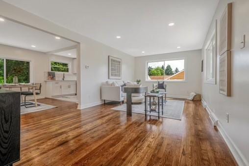 228 Kuehn Dr, Penn Twp, PA 15085 - dining space featuring wood finished floors and recessed lighting