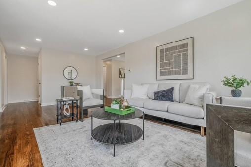 228 Kuehn Dr, Penn Twp, PA 15085 - living room featuring wood finished floors and recessed lighting