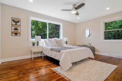228 Kuehn Dr, Penn Twp, PA 15085 - bedroom with wood finished floors, ceiling fan, and recessed lighting