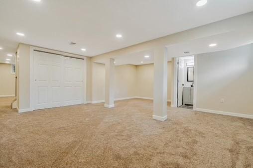228 Kuehn Dr, Penn Twp, PA 15085 - finished below grade area with light colored carpet and recessed lighting