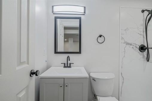 228 Kuehn Dr, Penn Twp, PA 15085 - bathroom with vanity and toilet