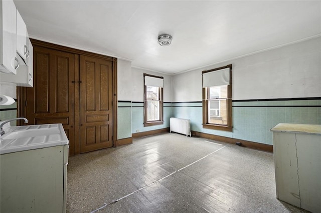 425 Concord Ave, City Of Greensburg, PA 15601 - unfurnished bedroom featuring radiator heating unit, wainscoting, and crown molding