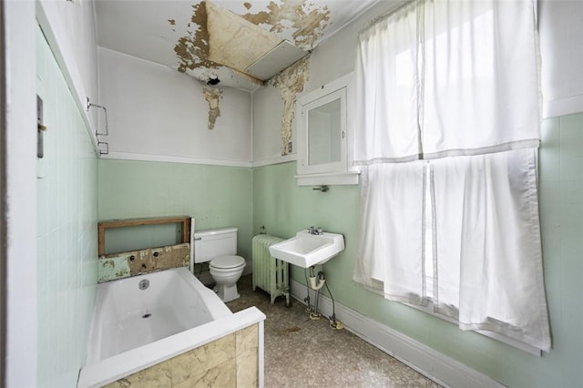 425 Concord Ave, City Of Greensburg, PA 15601 - full bath with radiator, a relaxing tiled tub, and plenty of natural light