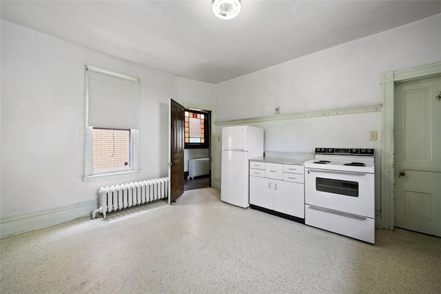 425 Concord Ave, City Of Greensburg, PA 15601 - kitchen featuring white appliances, radiator, white cabinets, and light countertops