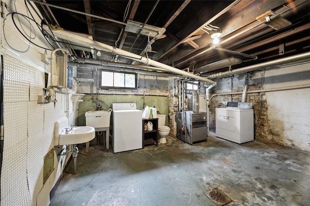 425 Concord Ave, City Of Greensburg, PA 15601 - below grade area with washer and dryer and a heating unit