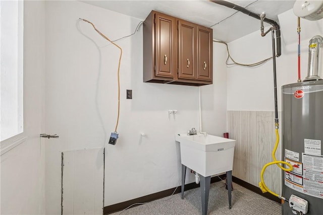 5111 Neville Rd, Neville Twp, PA 15225 - laundry room featuring gas water heater and cabinet space
