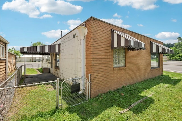 5111 Neville Rd, Neville Twp, PA 15225 - view of side of property featuring a gate and brick siding
