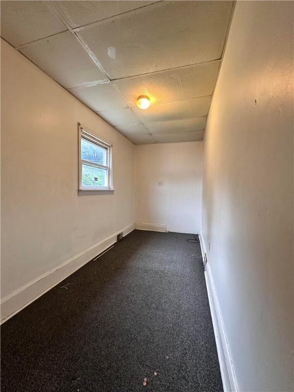 3027 Stayton St, Marshall Shadeland, PA 15212 - empty room featuring a paneled ceiling and dark colored carpet