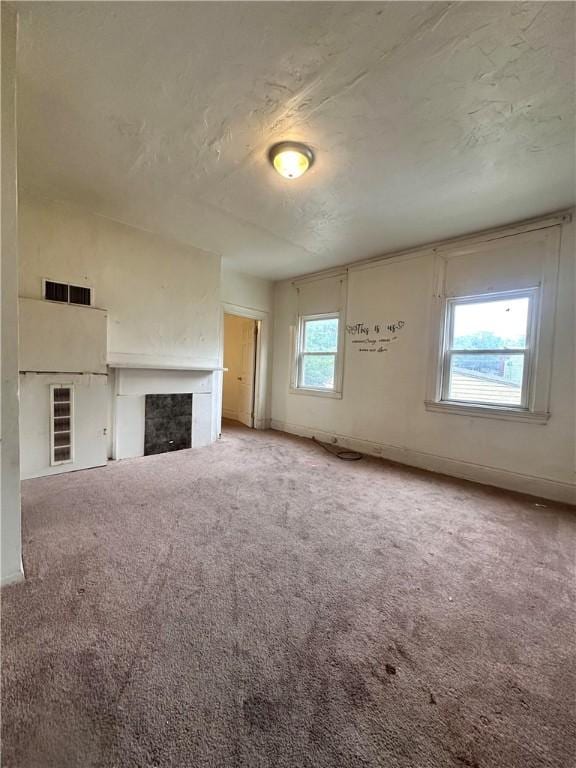 3027 Stayton St, Marshall Shadeland, PA 15212 - unfurnished living room with carpet flooring and a fireplace