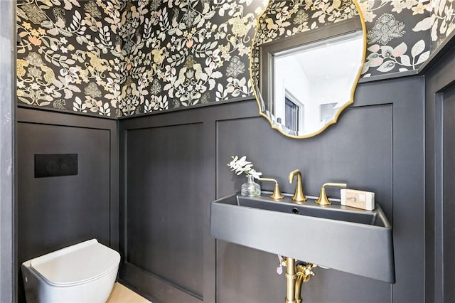 605 N Beatty, East Liberty, PA 15206 - half bathroom featuring toilet and a sink