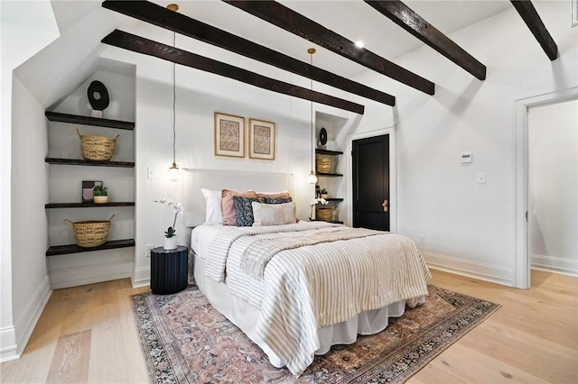 605 N Beatty, East Liberty, PA 15206 - bedroom featuring beam ceiling and light wood-style floors