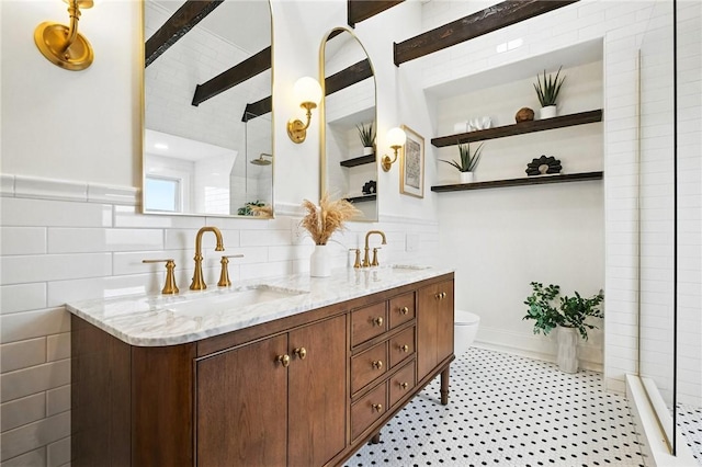 605 N Beatty, East Liberty, PA 15206 - bathroom with double vanity, tiled shower, and beamed ceiling