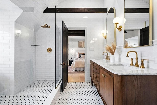 605 N Beatty, East Liberty, PA 15206 - ensuite bathroom featuring double vanity, a shower stall, tile patterned floors, and tile walls