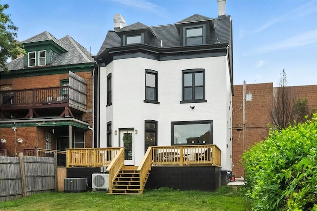 605 N Beatty, East Liberty, PA 15206 - rear view of house featuring a chimney, brick siding, and a wooden deck