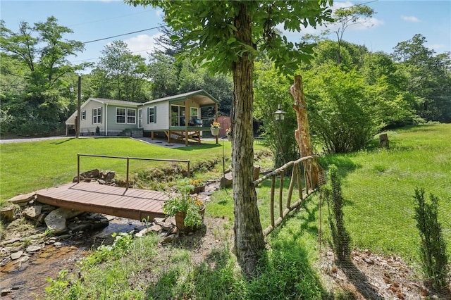 171 Fetter Ln, Ligonier Twp, PA 15658 - view of green lawn featuring a deck