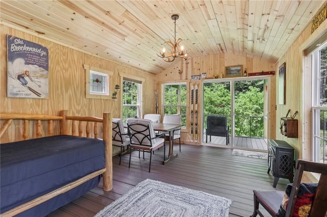171 Fetter Ln, Ligonier Twp, PA 15658 - bedroom featuring vaulted ceiling, a chandelier, wooden walls, wooden ceiling, and access to exterior