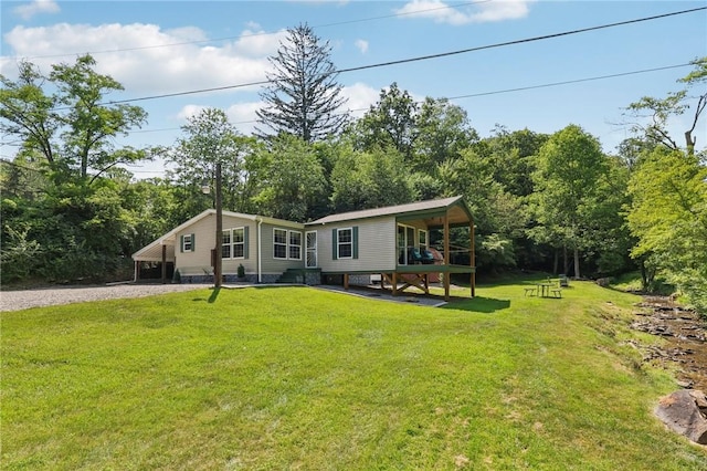 171 Fetter Ln, Ligonier Twp, PA 15658 - view of front of property with a front lawn and gravel driveway