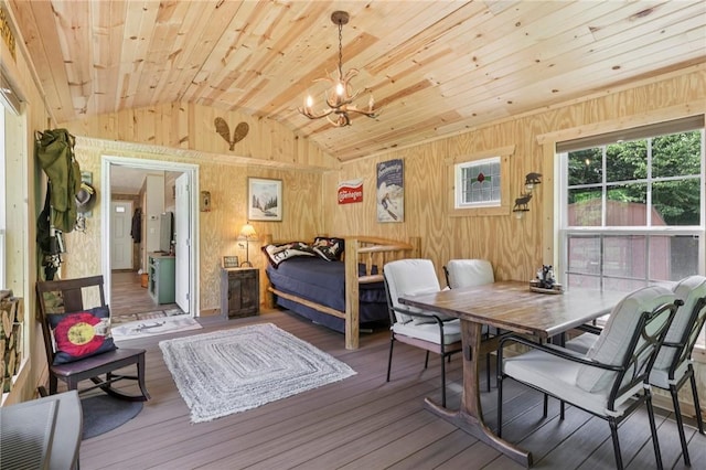 171 Fetter Ln, Ligonier Twp, PA 15658 - bedroom with vaulted ceiling, a chandelier, wooden ceiling, wood walls, and wood finished floors