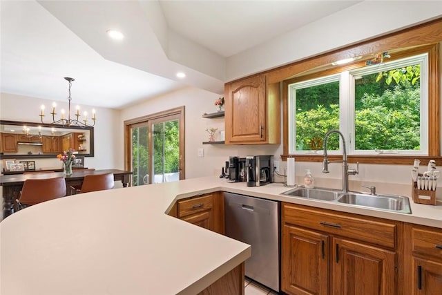 2657 Bingham Dr, Saint Clair, PA 15241 - kitchen featuring stainless steel dishwasher, light countertops, open shelves, hanging light fixtures, and brown cabinets