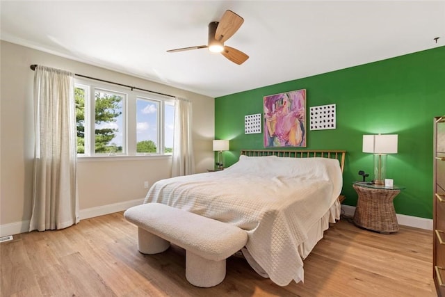 2657 Bingham Dr, Saint Clair, PA 15241 - bedroom with wood finished floors and a ceiling fan
