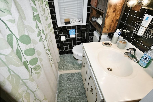 300 Sherman Ave, Dravosburg, PA 15034 - bathroom featuring tile walls, vanity, a shower with curtain, decorative backsplash, and tile patterned flooring