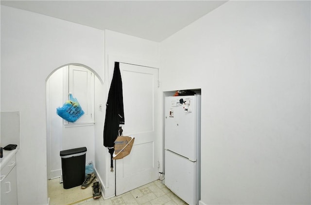 300 Sherman Ave, Dravosburg, PA 15034 - laundry area featuring arched walkways and light flooring
