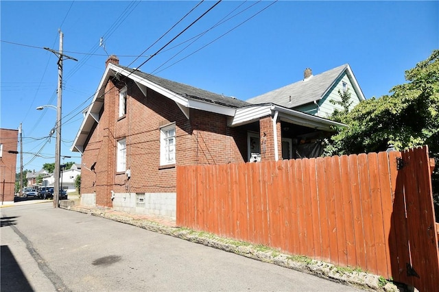 300 Sherman Ave, Dravosburg, PA 15034 - view of property exterior featuring brick siding