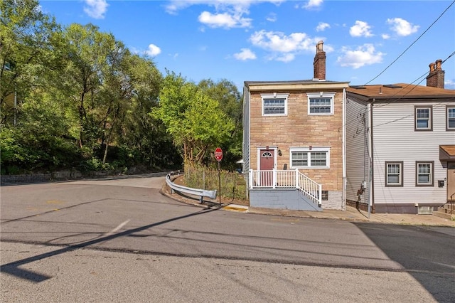 98 S 9th St, South Side, PA 15203 - view of front of house featuring a chimney