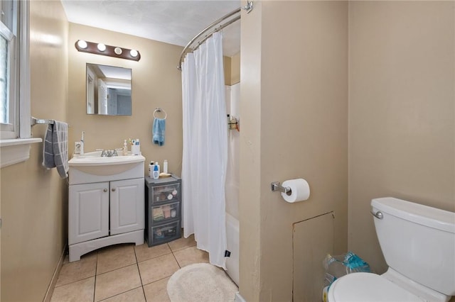 98 S 9th St, South Side, PA 15203 - full bath featuring vanity, tile patterned floors, and shower / bath combo with shower curtain