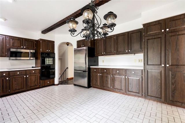 3215 Concord St, Neshannock Twp, PA 16105 - kitchen with black appliances, brick patterned flooring, light countertops, dark brown cabinets, and beam ceiling